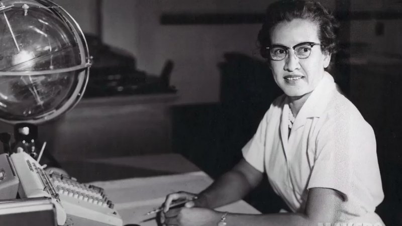 katherine_johnson_at her desk at Langley with a celestrial training device